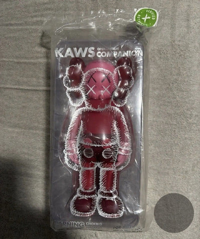 KAWS — Holiday Indonesia Accomplice Black Vinyl Figure 11.5" 2023